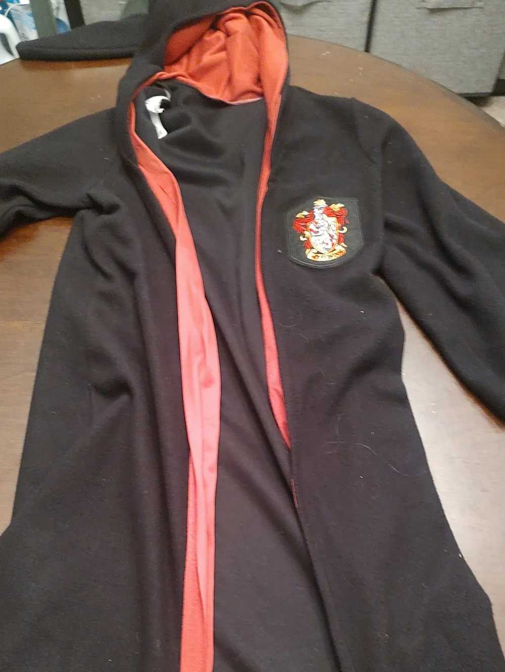 Harry Potter Griffindor  Black Hooded Robe with Red Trim and Crest Patch
